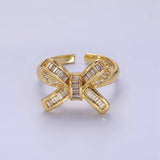 Penelope Gold Bow Clam Ribbon CZ Baguette Adjustable Ring