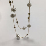 Double Pearl and gold necklace