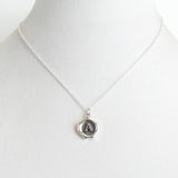 Small All Silver wandering Seal Necklace *click for more letters - Estilo Concept Store